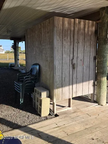 a view of balcony with furniture