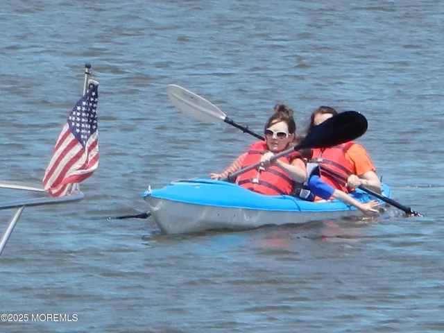 a view of a balcony with chairs