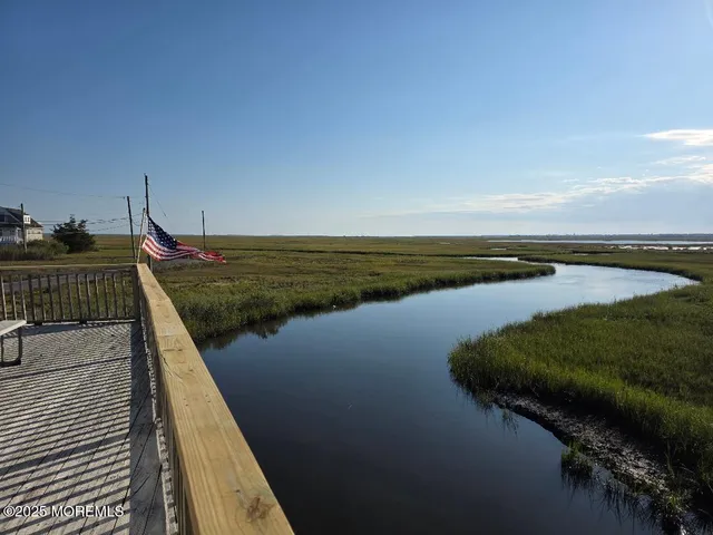 a view of a lake with a outdoor space