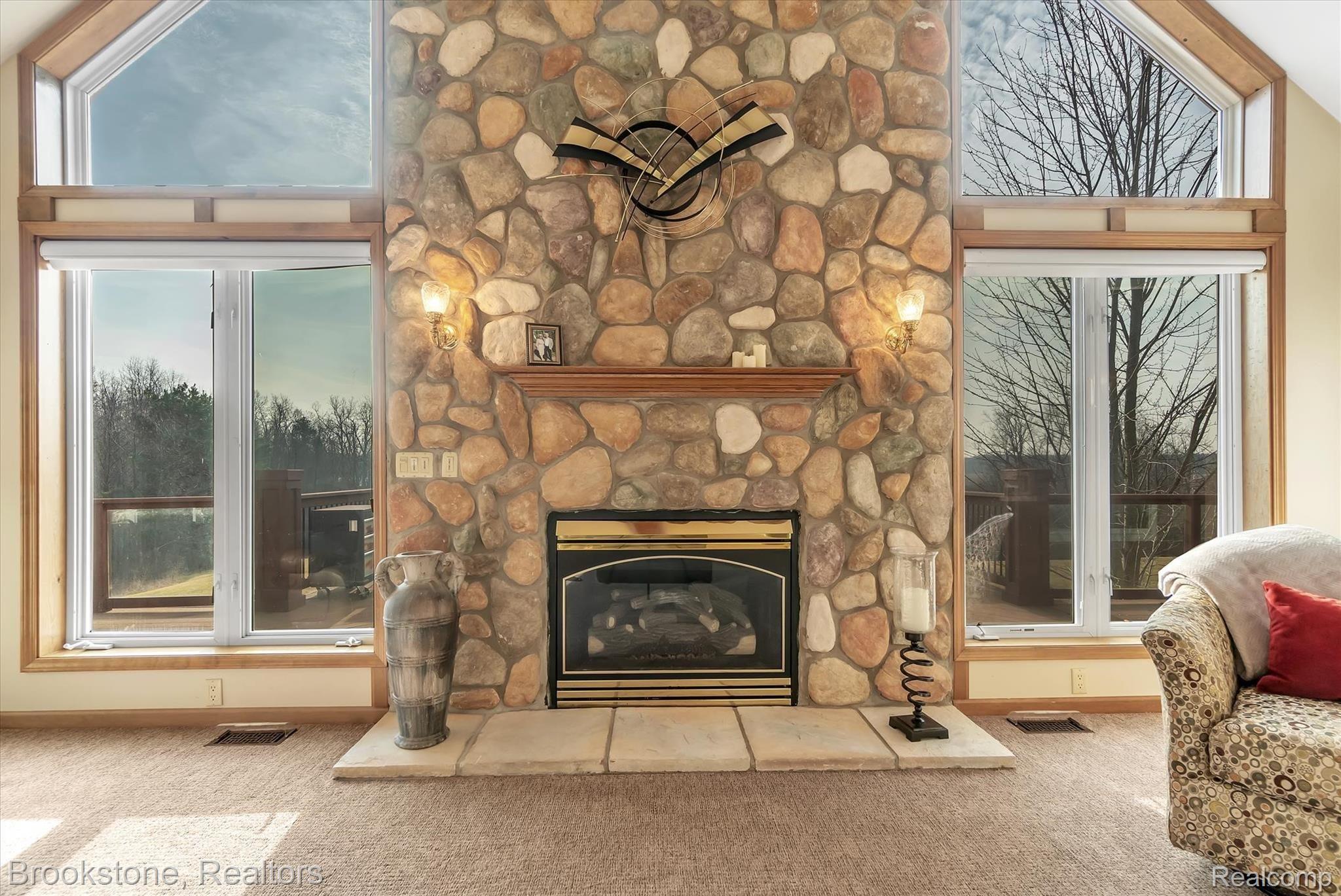 7474 Bennett Lake Road Fenton, MI 48430 - Photo 5 of 40 Cozy up with a warm fire at a push of a button!