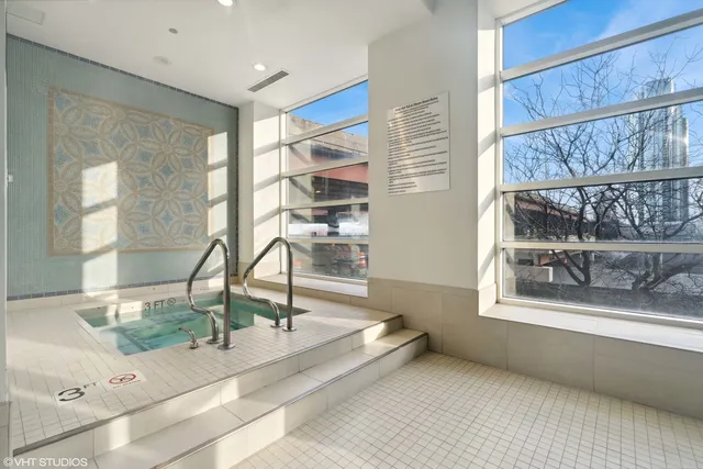 a view of a patio with couches chairs and a potted plants