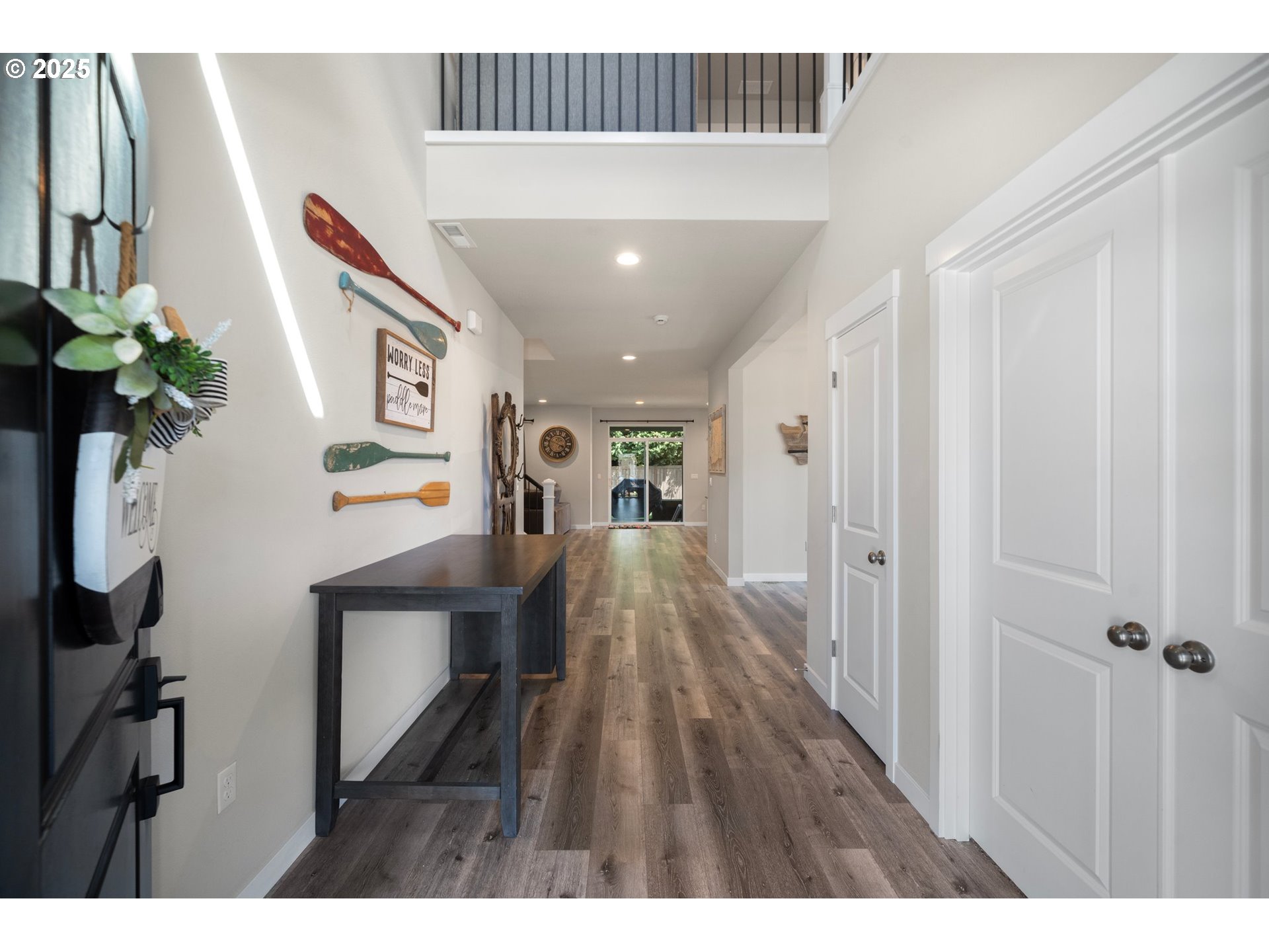 8852 North 5th Street Ridgefield, WA 98642 - Photo 4 of 47 a view of entryway with wooden floor