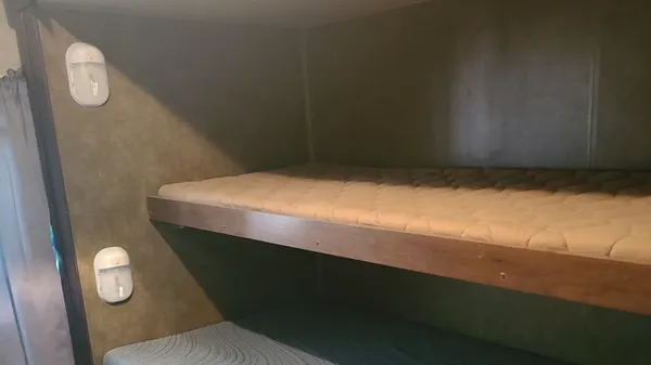 a bathroom with a sink a mirror a toilet and vanity