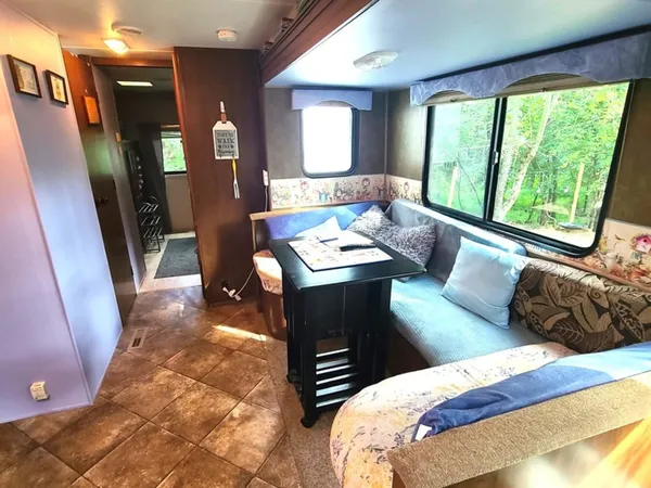 a view of swimming pool with outdoor seating