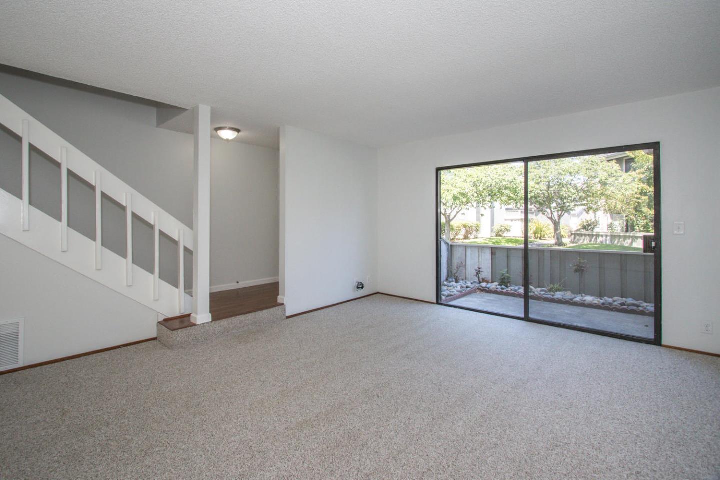 810 Juno Lane Foster City, CA 94404 - Photo 7 of 43 an empty room with windows