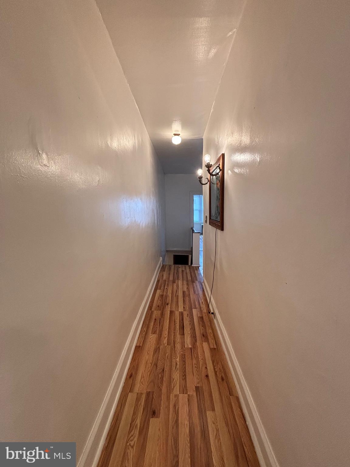 3219 North 29th Street Philadelphia, PA 19129 - Photo 27 of 48 a view of a hallway with wooden floor