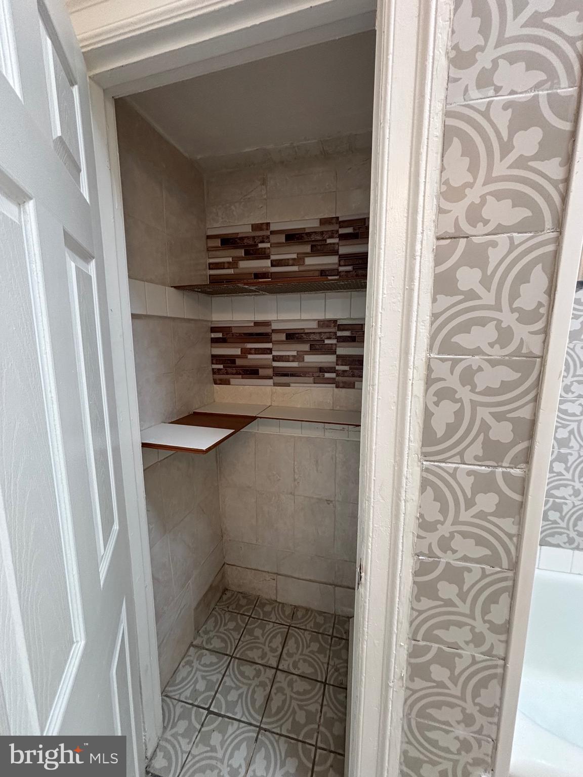 3219 North 29th Street Philadelphia, PA 19129 - Photo 36 of 48 a kitchen with a refrigerator and a stove