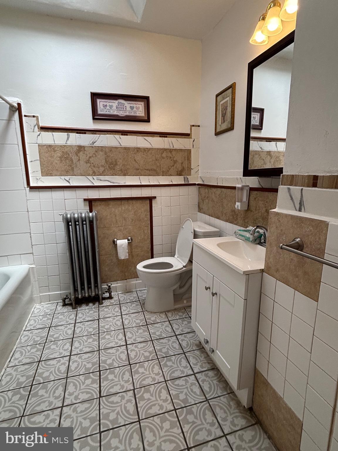 3219 North 29th Street Philadelphia, PA 19129 - Photo 38 of 48 a bathroom with a toilet sink and mirror