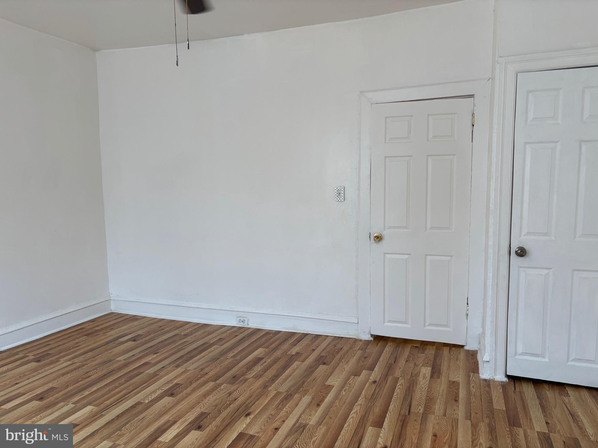 3219 North 29th Street Philadelphia, PA 19129 - Photo 41 of 48 a view of an empty room with wooden floor