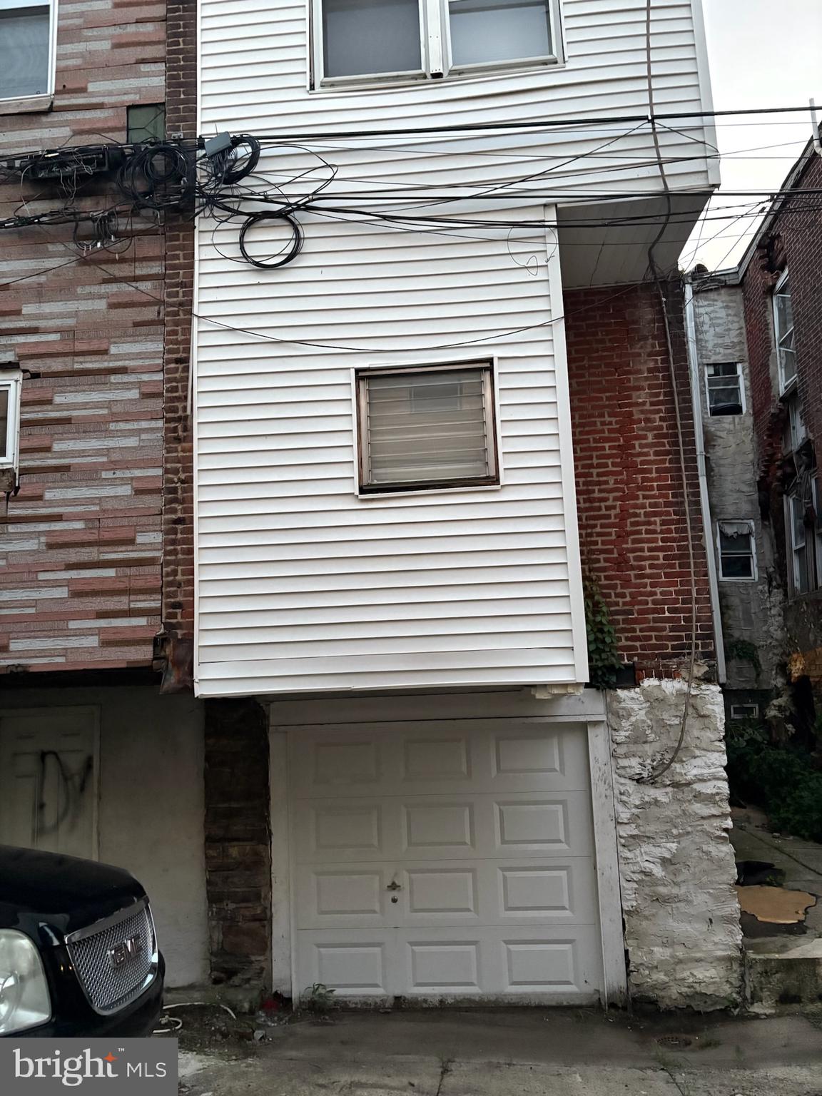 3219 North 29th Street Philadelphia, PA 19129 - Photo 44 of 48 a view of a house with a garage