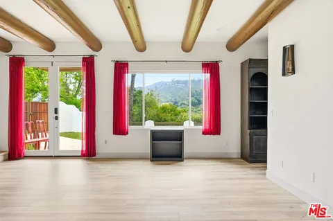 a living room with a large window