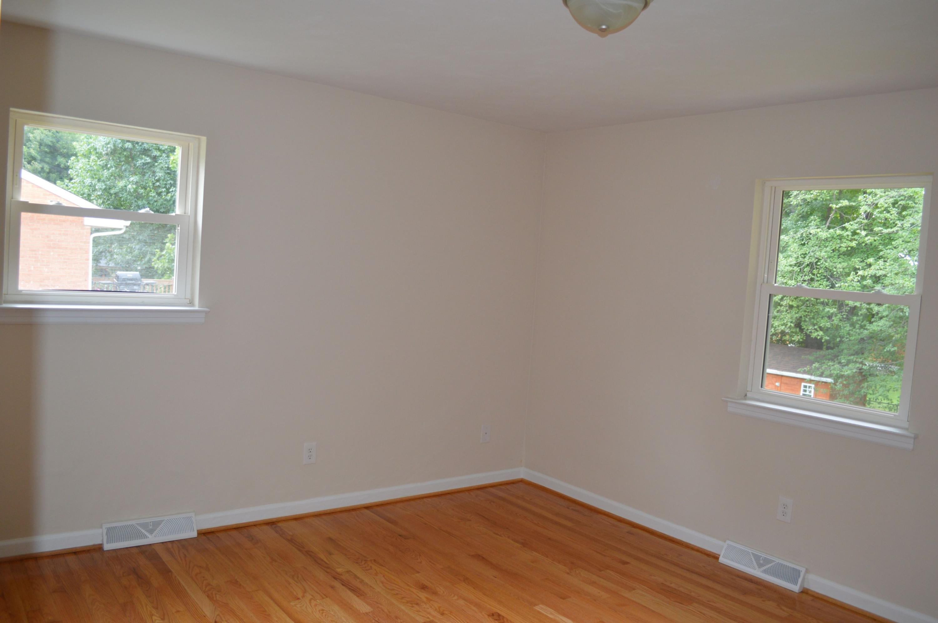 520 Olney Road Vinton, VA 24179 - Photo 16 of 29 wooden floor in an empty room with a window