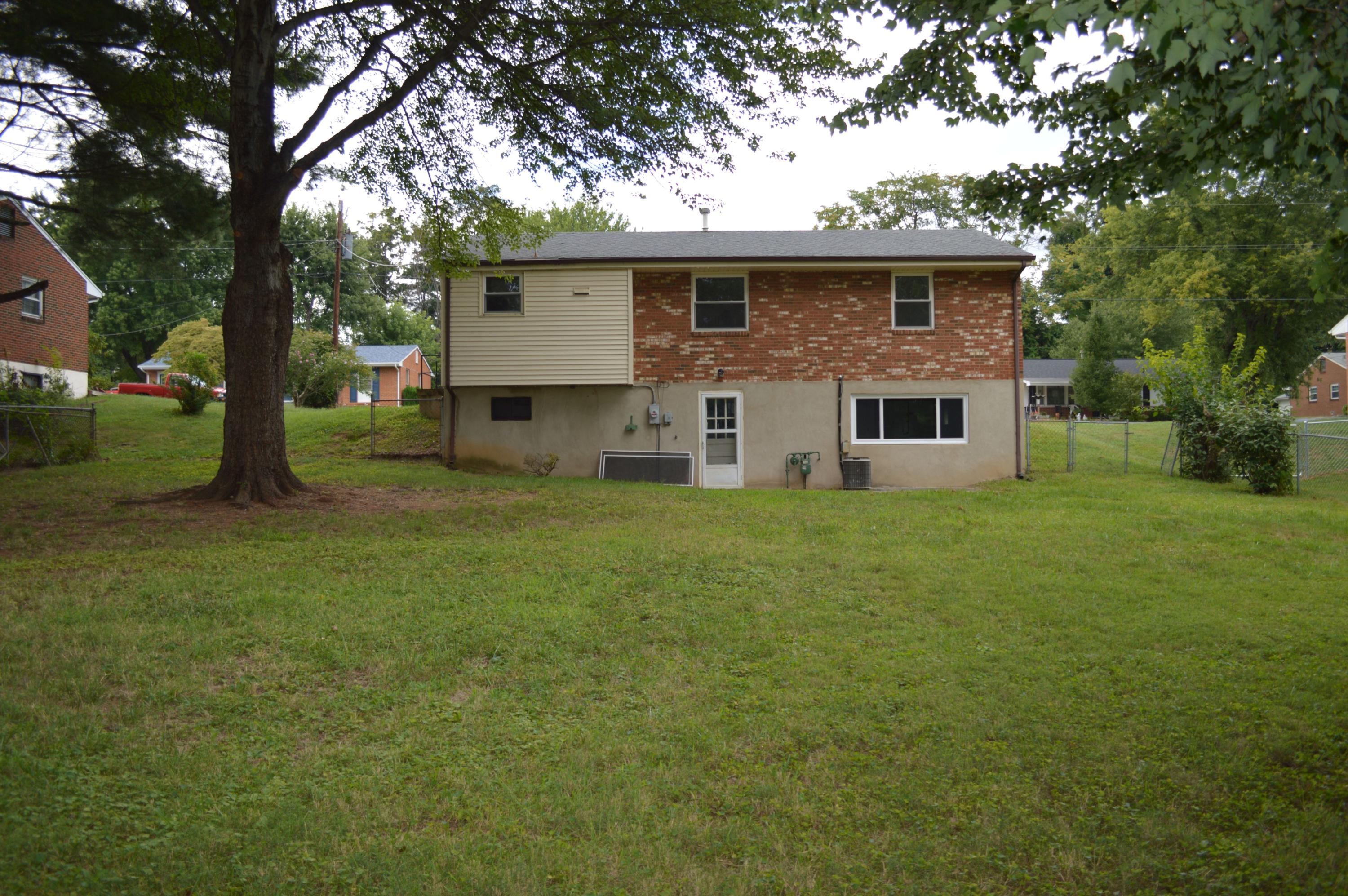 520 Olney Road Vinton, VA 24179 - Photo 29 of 29 a front view of house with yard and trees