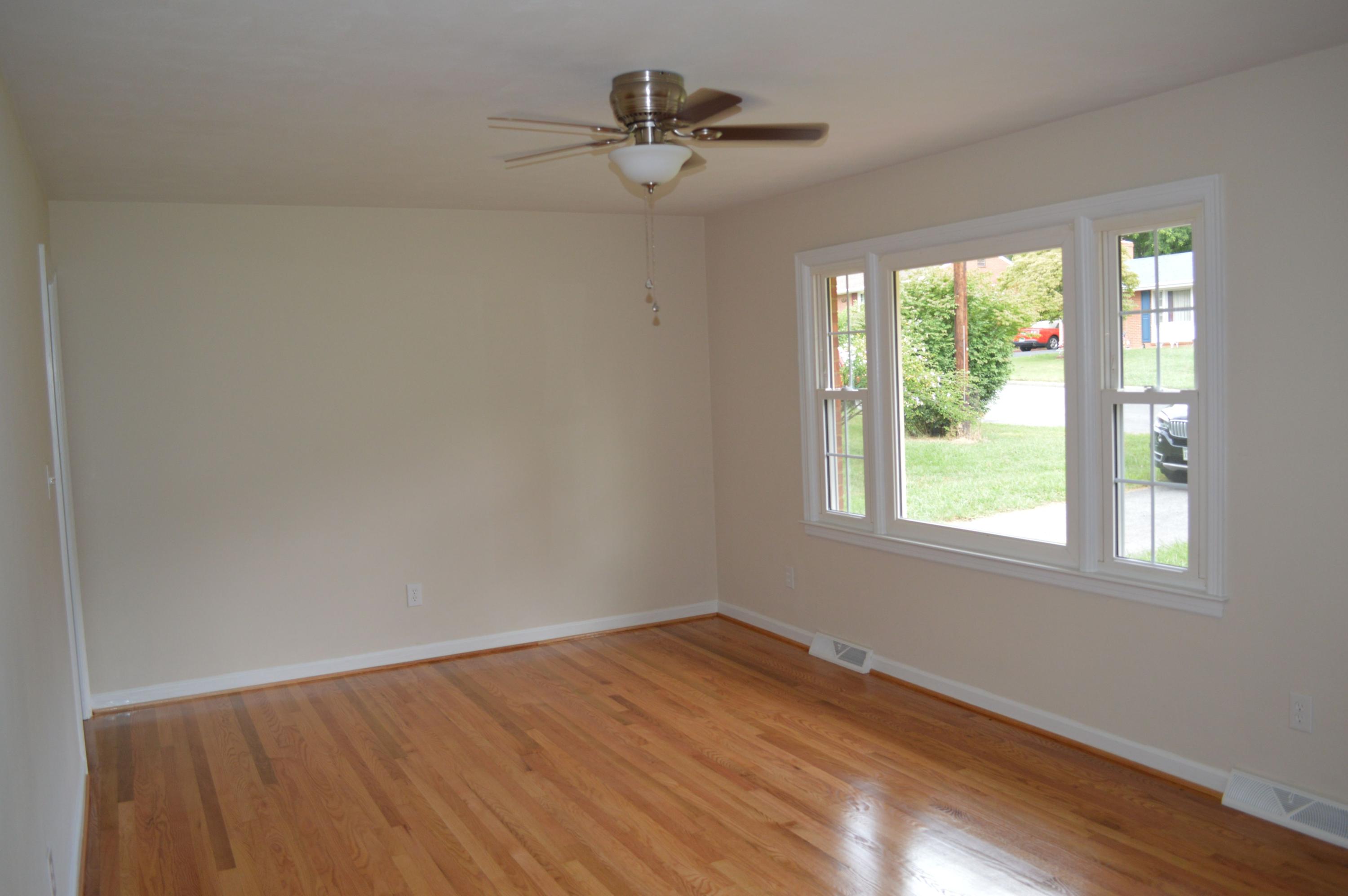 520 Olney Road Vinton, VA 24179 - Photo 4 of 29 wooden floor in an empty room with a window