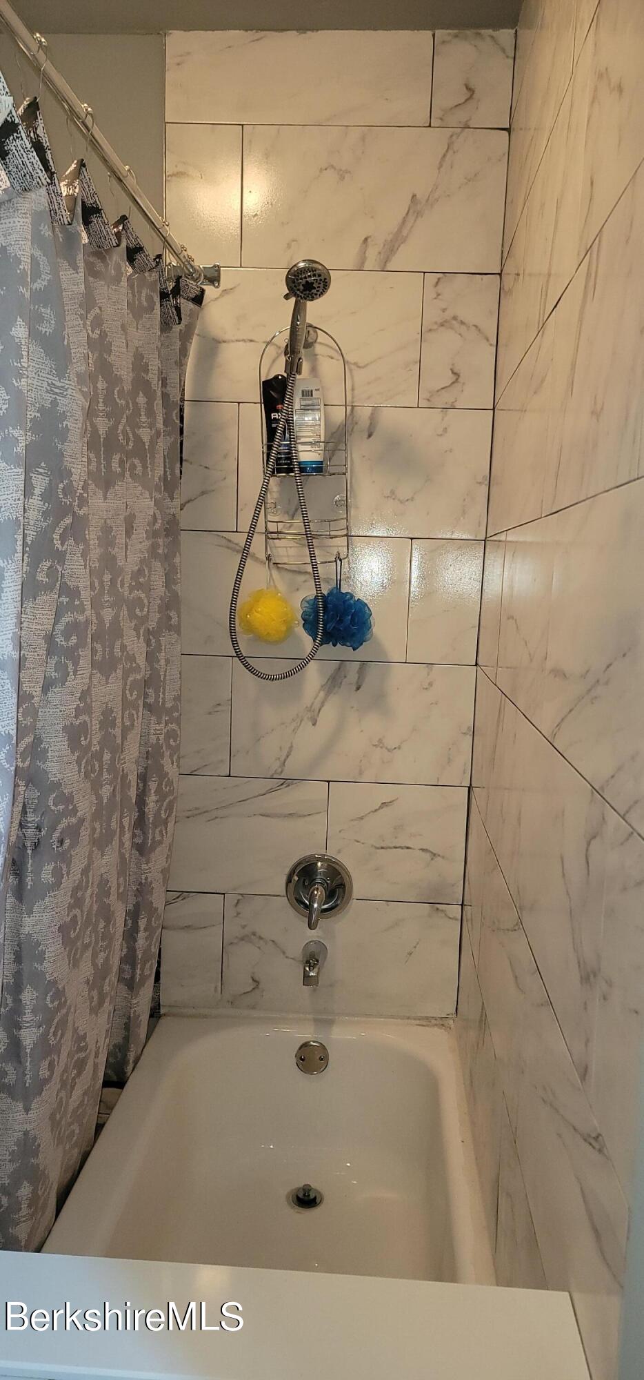 18 Grove Avenue Adams, MA 01220 - Photo 5 of 10 a bathroom with a shower
