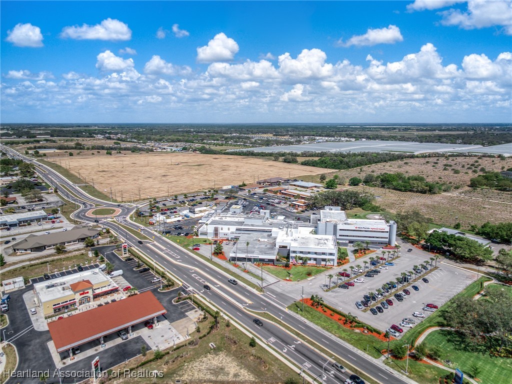 3593 Desoto Road Sebring, FL 33870 - Photo 5 of 15 an aerial view of a city