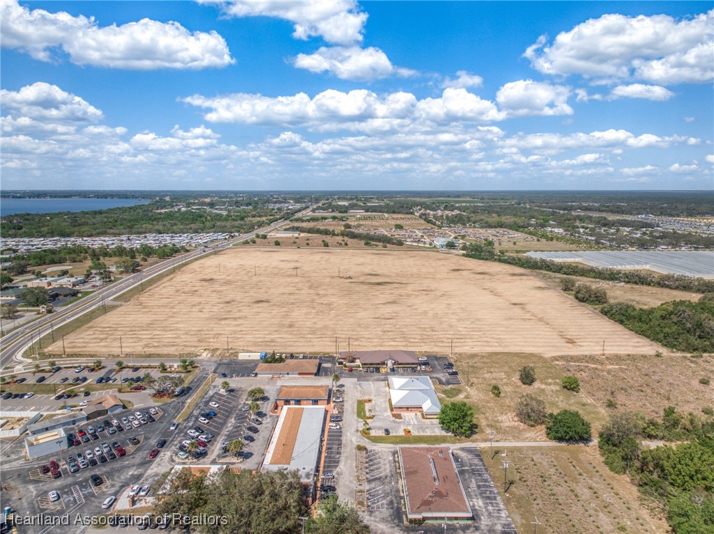 3593 Desoto Road Sebring, FL 33870 - Photo 6 of 15 an aerial view of residential building and ocean