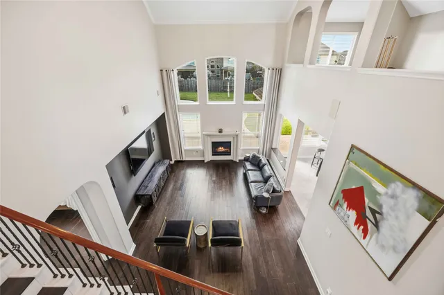 a view of living room with furniture and a flat screen tv