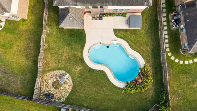 an aerial view of a swimming pool