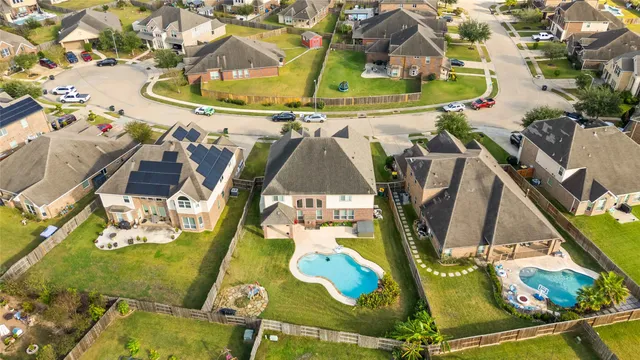 an aerial view of a swimming pool