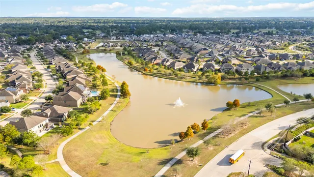 an aerial view of a house with a ocean view