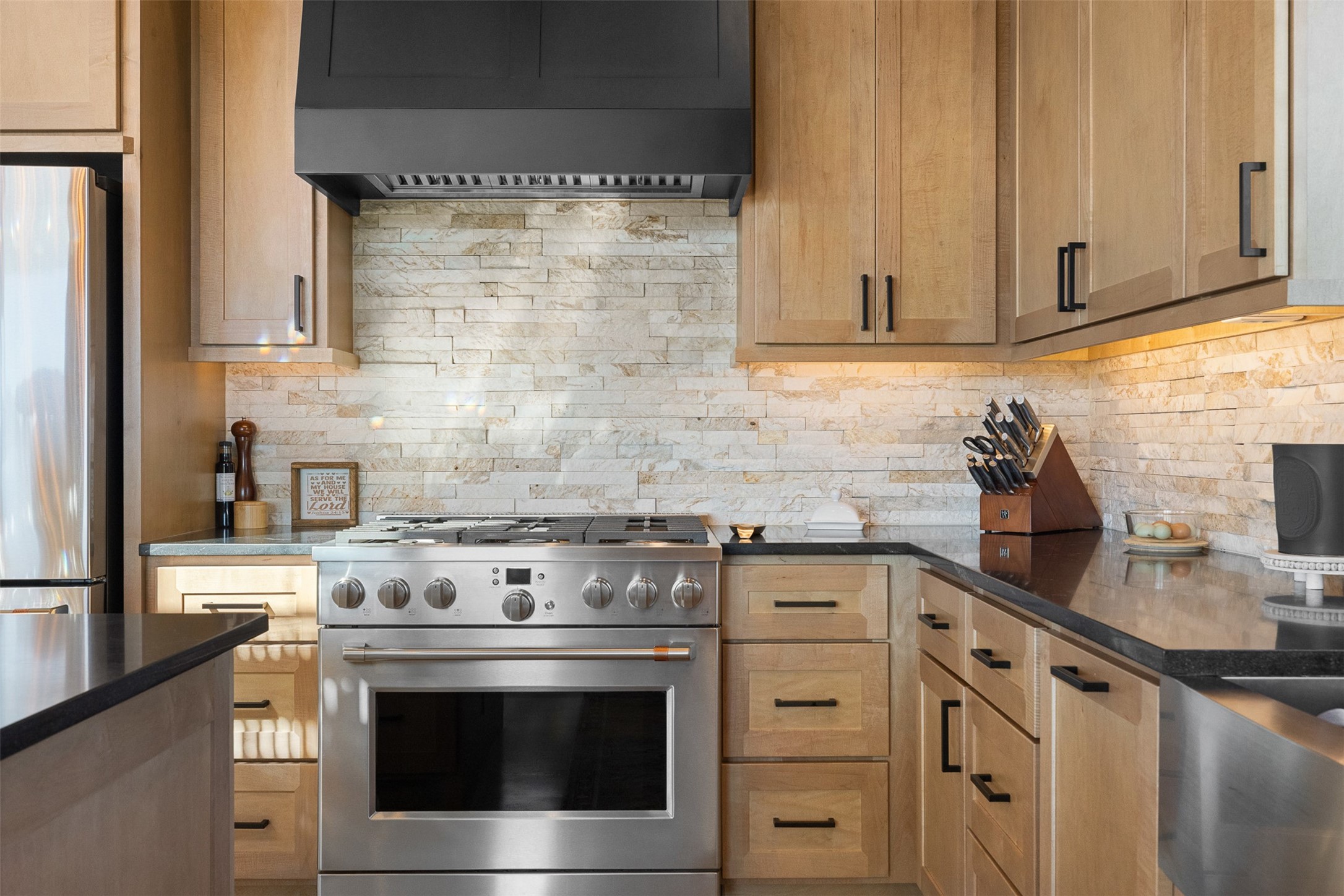 2134 Carter Road Bellville, TX 77418 - Photo 15 of 38 a stove top oven sitting inside of a kitchen