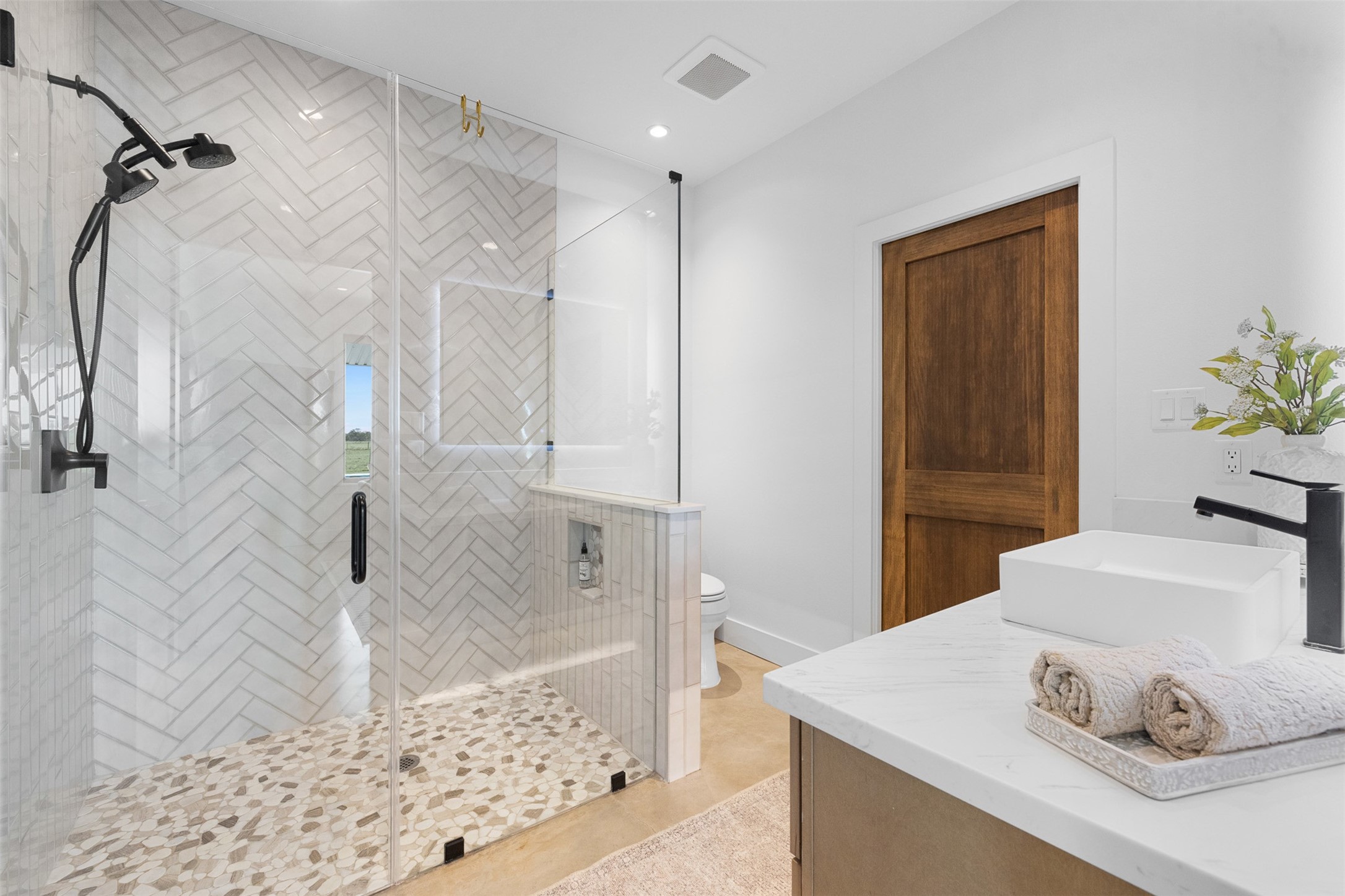 2134 Carter Road Bellville, TX 77418 - Photo 19 of 38 a bathroom with a sink and a shower