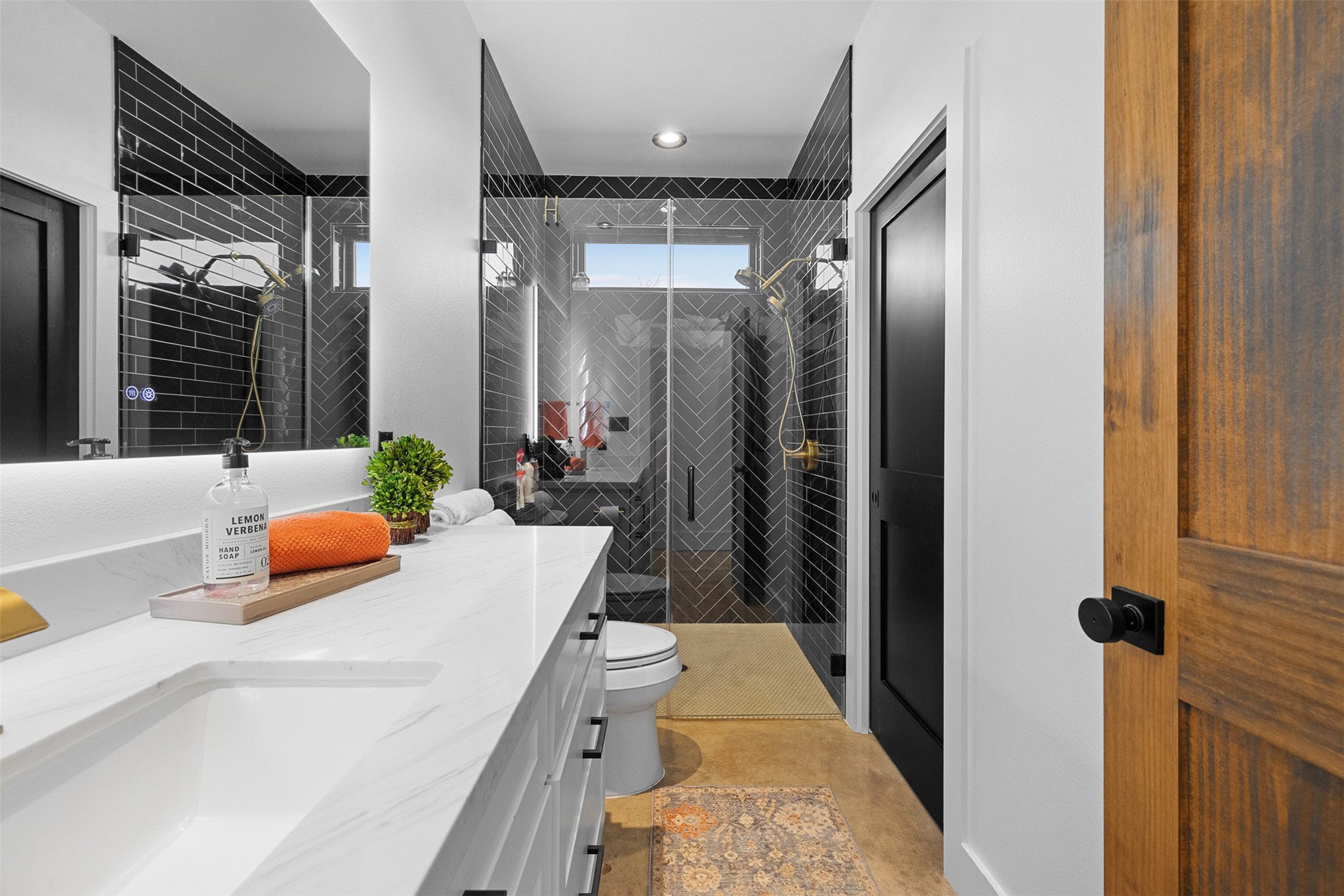 2134 Carter Road Bellville, TX 77418 - Photo 21 of 38 a bathroom with a tub and shower