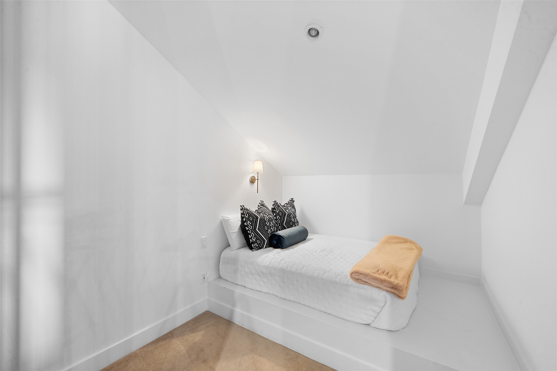 2134 Carter Road Bellville, TX 77418 - Photo 24 of 38 a bed sitting in a bedroom next to a white wall