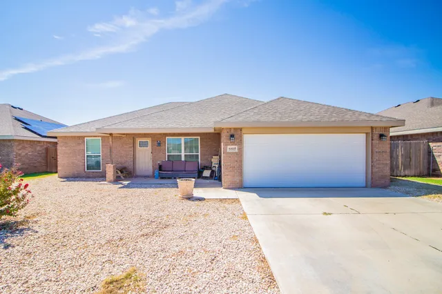 a front view of a house with a patio