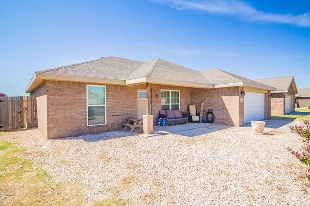 a view of a house with a patio