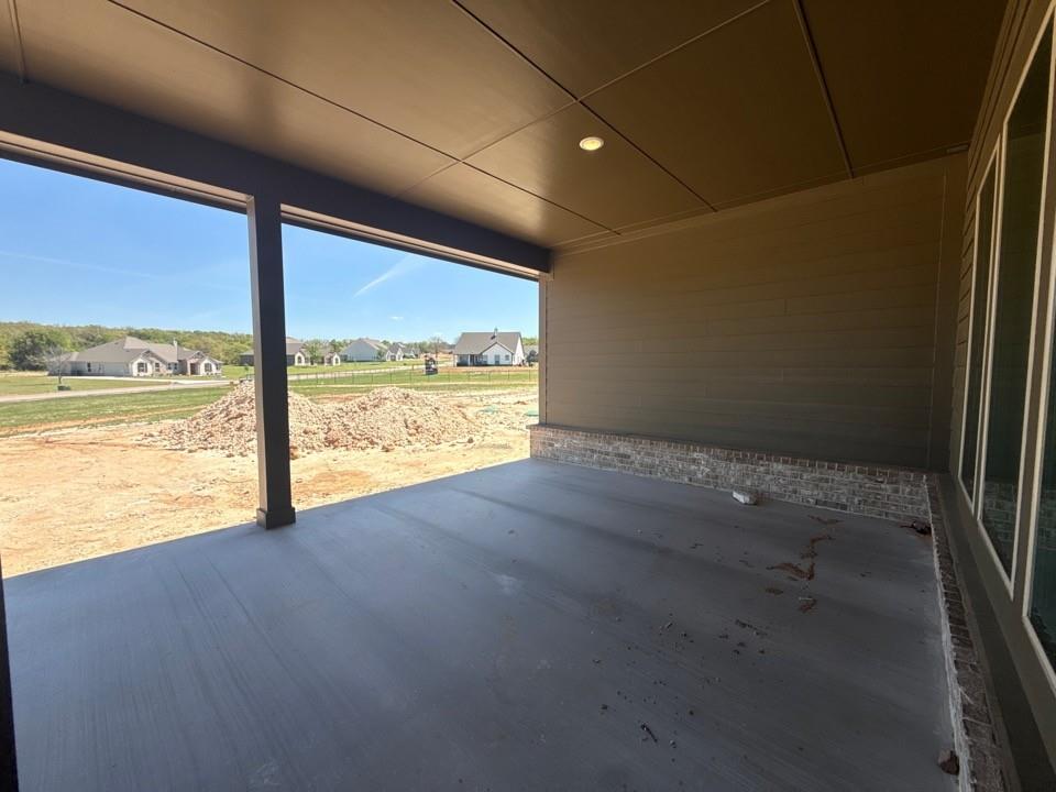 605 Tay Tay Way Springtown, TX 76082 - Photo 16 of 19 a view of an empty room with a ocean view