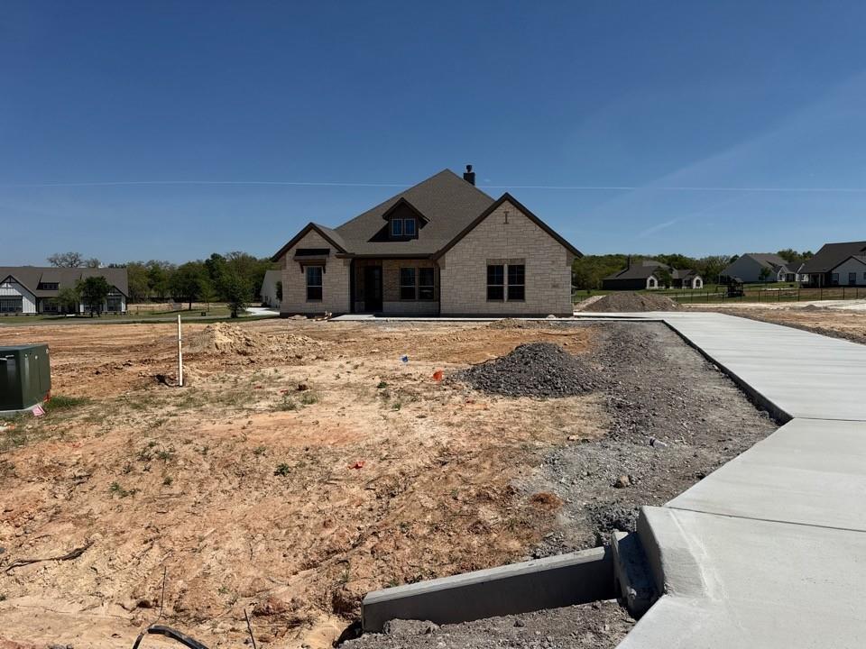 605 Tay Tay Way Springtown, TX 76082 - Photo 19 of 19 a view of a house with a yard