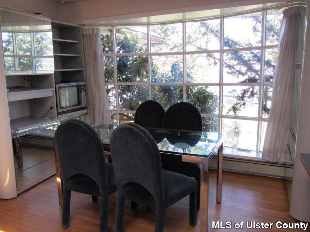 Heiden Road Monticello, NY 12701 - Photo 3 of 15 a living room with furniture a window and a fireplace