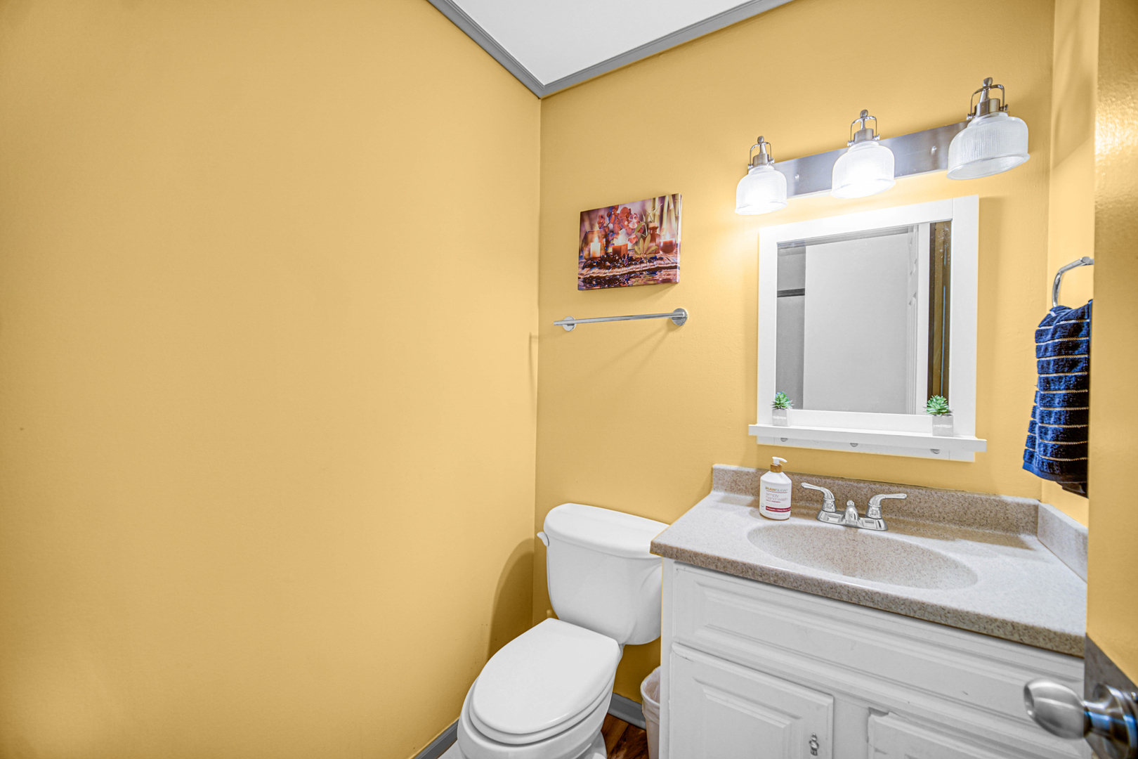 1326 Spring Valley Drive, Unit 1326 Carol Stream, IL 60188 - Photo 14 of 18 a bathroom with a toilet sink and mirror