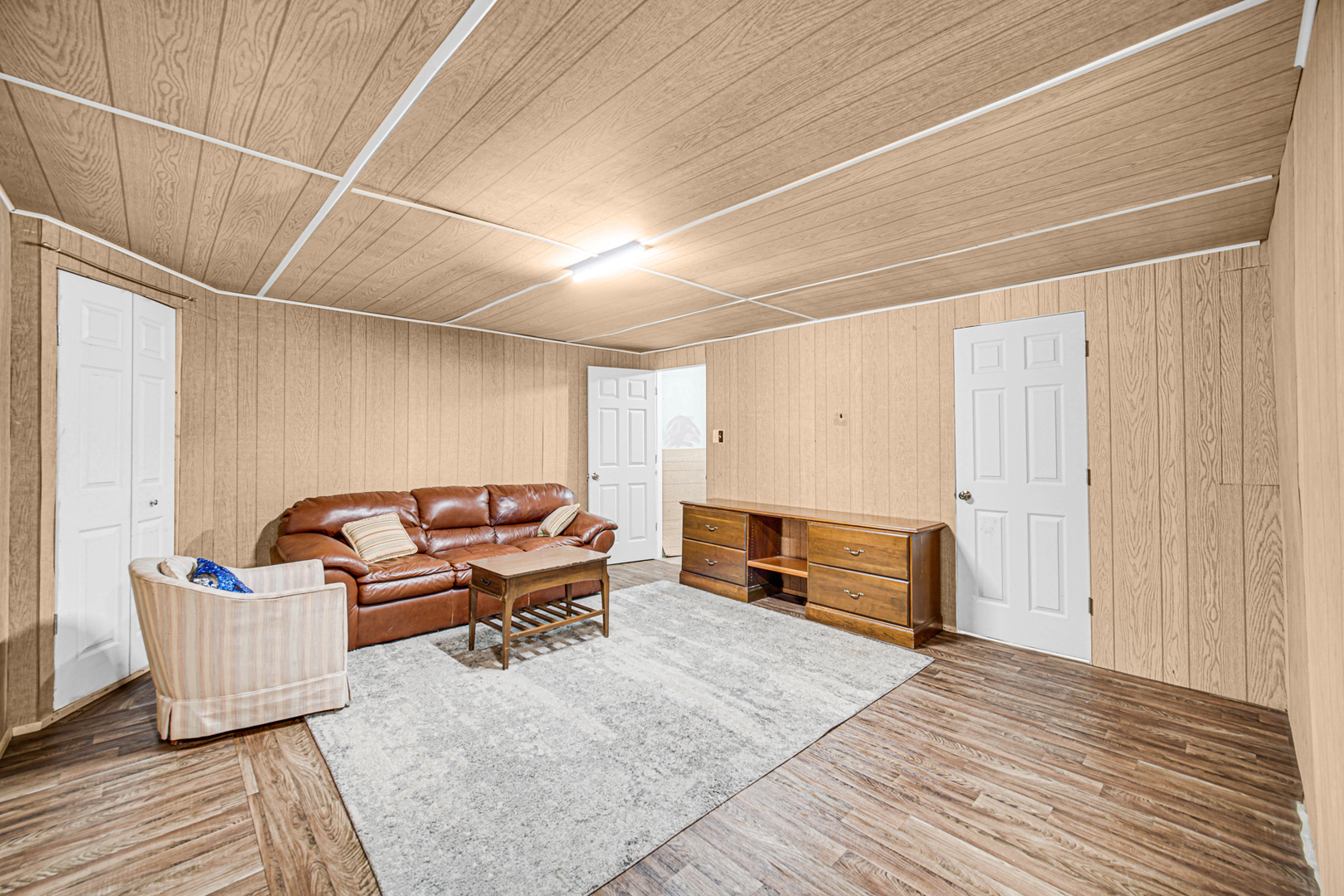 1326 Spring Valley Drive, Unit 1326 Carol Stream, IL 60188 - Photo 15 of 18 a living room with furniture and wooden floor