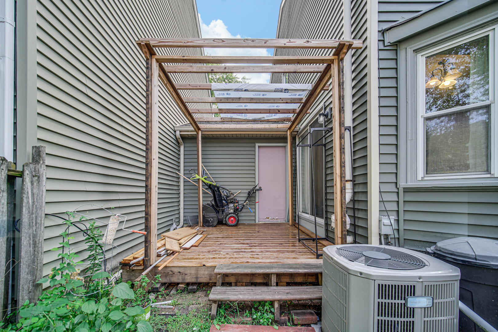 1326 Spring Valley Drive, Unit 1326 Carol Stream, IL 60188 - Photo 18 of 18 a view of house with patio