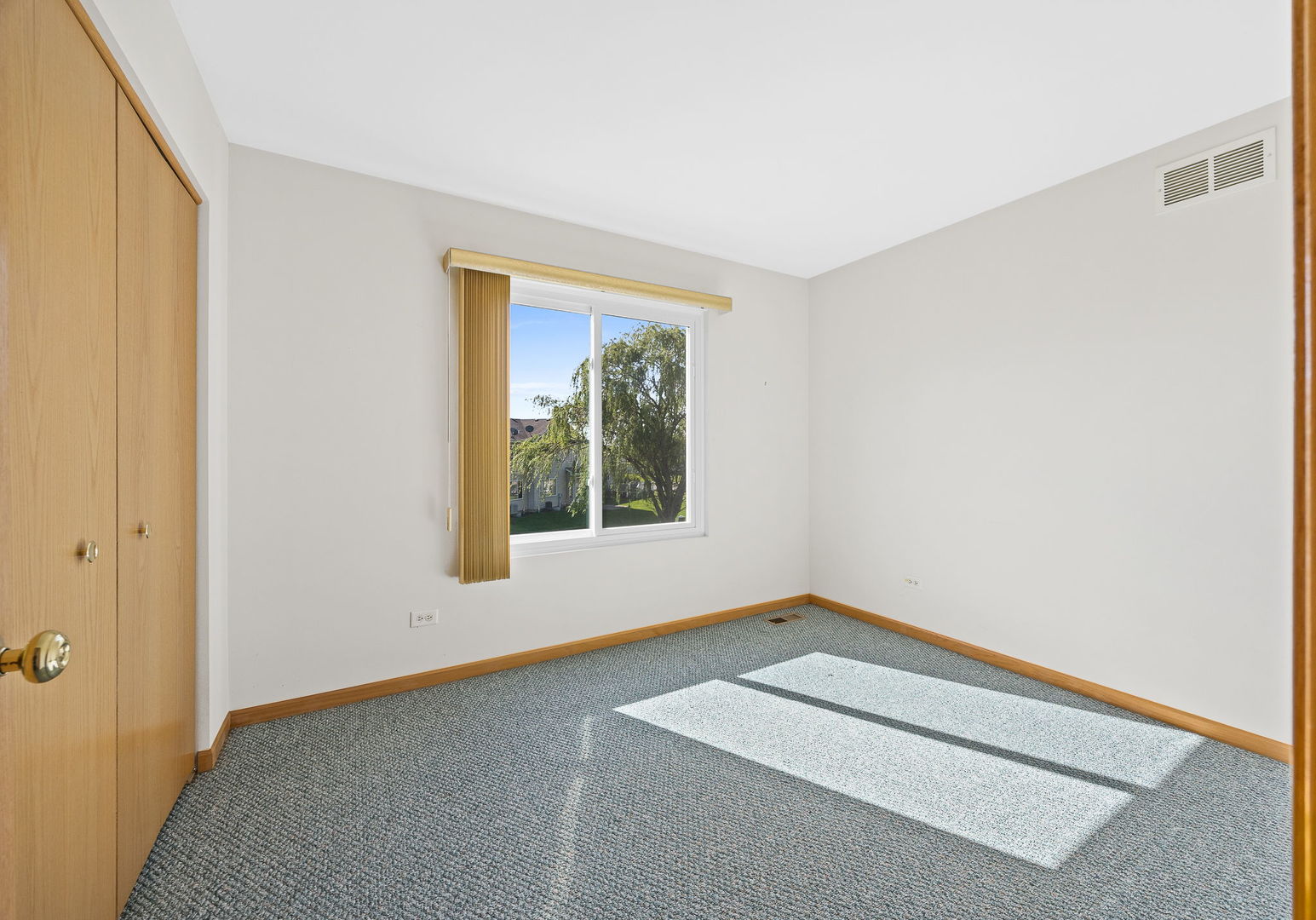 658 Chestnut Ridge Minooka, IL 60447 - Photo 13 of 30 a view of an empty room with a window