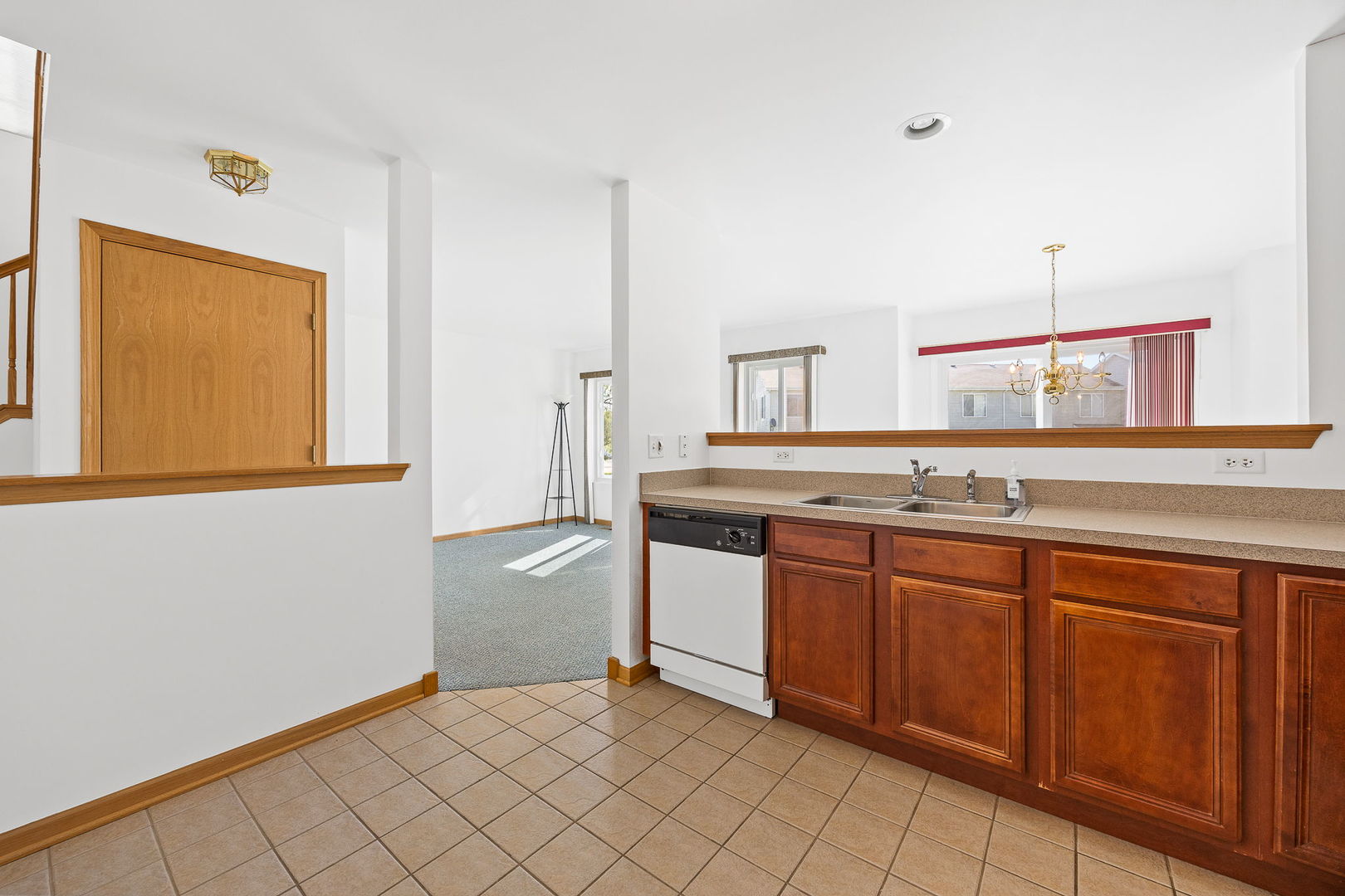 658 Chestnut Ridge Minooka, IL 60447 - Photo 6 of 30 a spacious bathroom with a granite countertop sink and a mirror