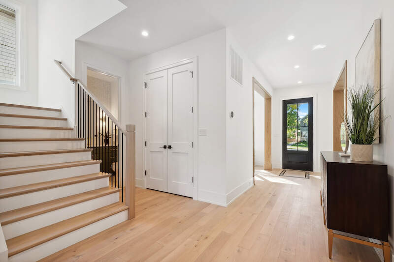 1209 Maple Avenue Wilmette, IL 60091 - Photo 8 of 28 a view of a hallway with wooden floor and staircase