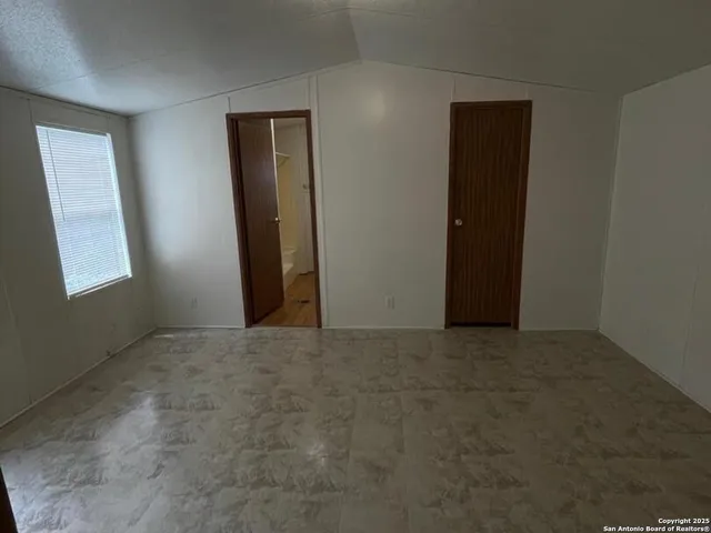 an empty room with window