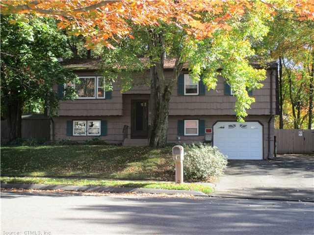 68 Racebrook Road Meriden, CT 06451 - Photo 1 of 1 a view of a house with a yard and large tree