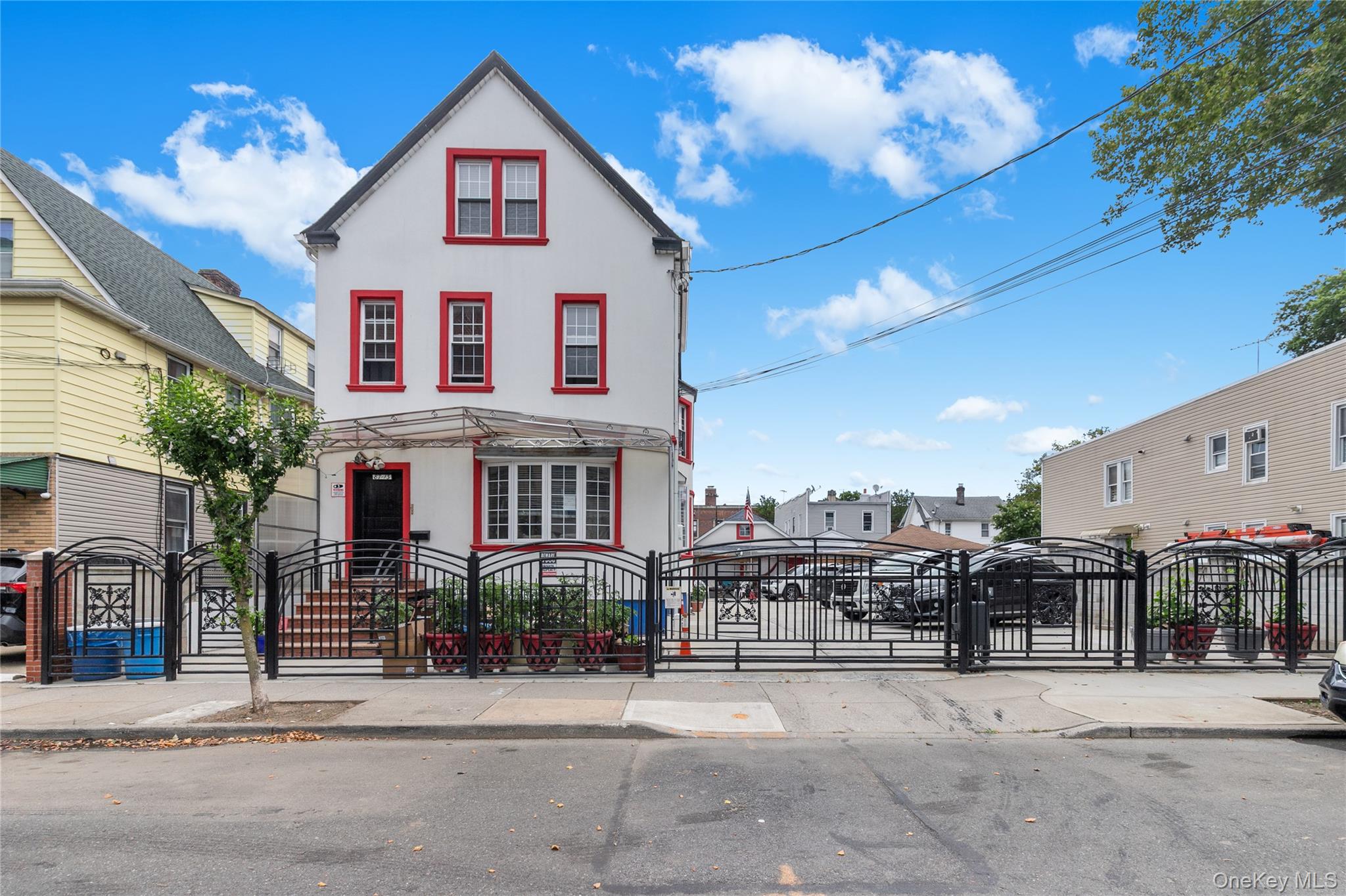 8713 135th Street, Unit 3 Queens, NY 11418 - Photo 1 of 22 a view of a house and a yard