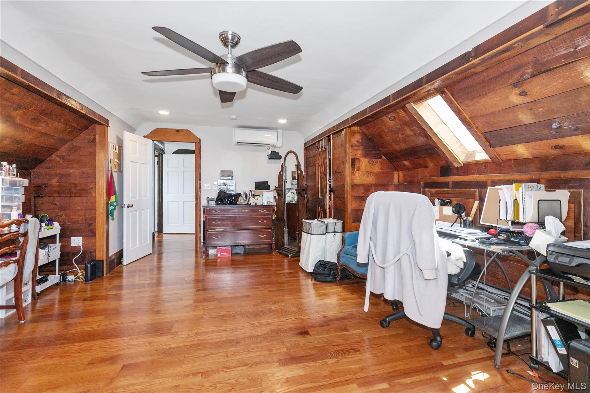 8713 135th Street, Unit 3 Queens, NY 11418 - Photo 14 of 22 a view of a livingroom with furniture and a gym equipment
