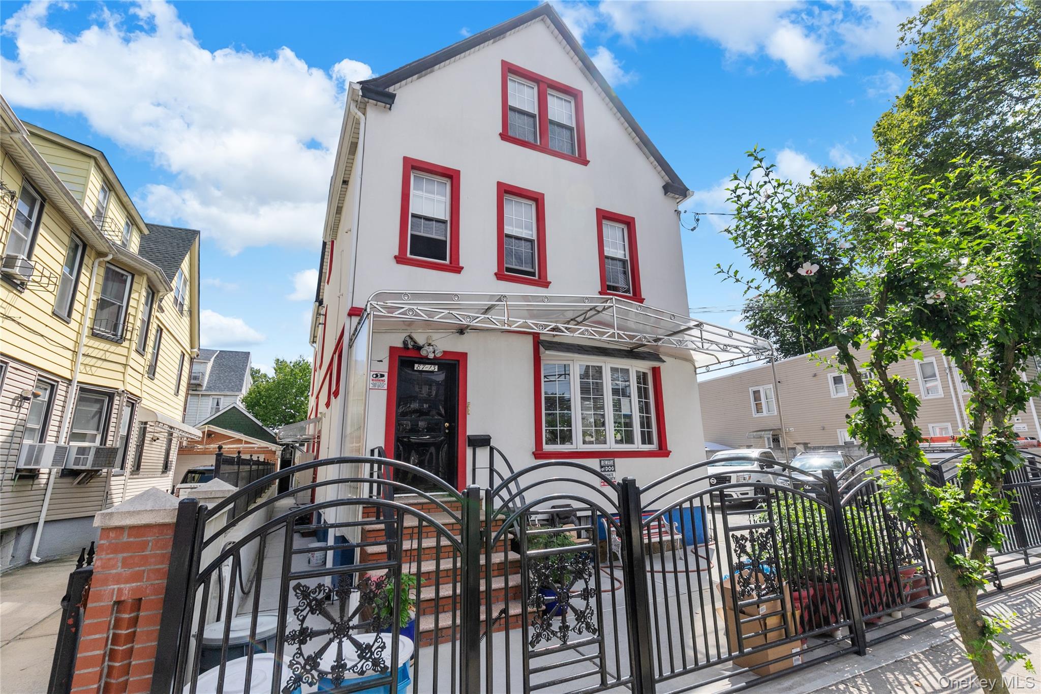 8713 135th Street, Unit 3 Queens, NY 11418 - Photo 20 of 22 a front view of a house with balcony