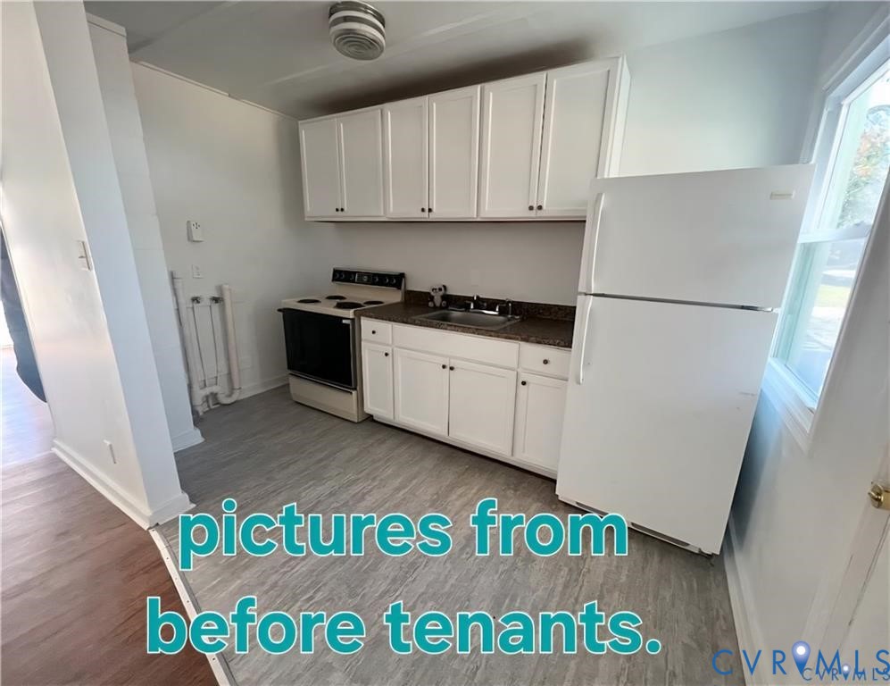 14204 Arwood Road Disputanta, VA 23842 - Photo 2 of 12 a view of a kitchen with a sink and dishwasher