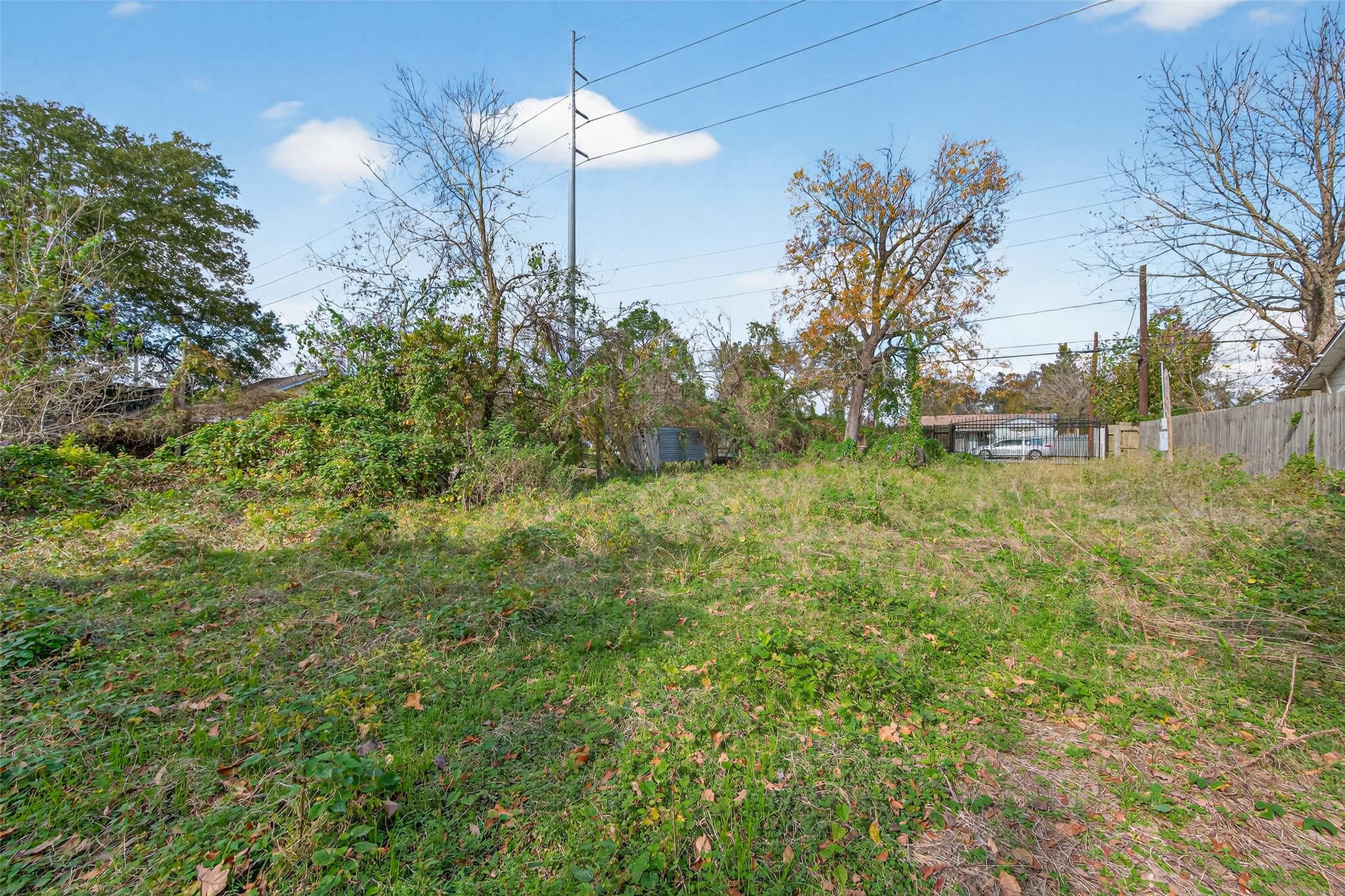 5002 Firnat Street Houston, TX 77016 - Photo 5 of 8 a view of a house with a yard