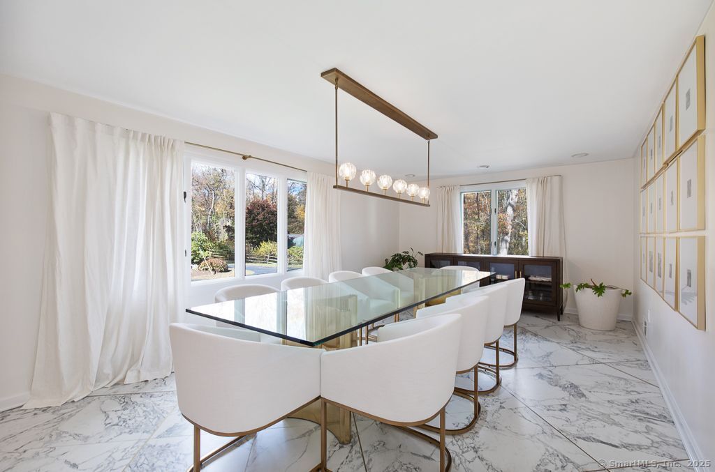 5 Mohawk Lane Woodbridge, CT 06525 - Photo 12 of 28 a dining room with furniture and window