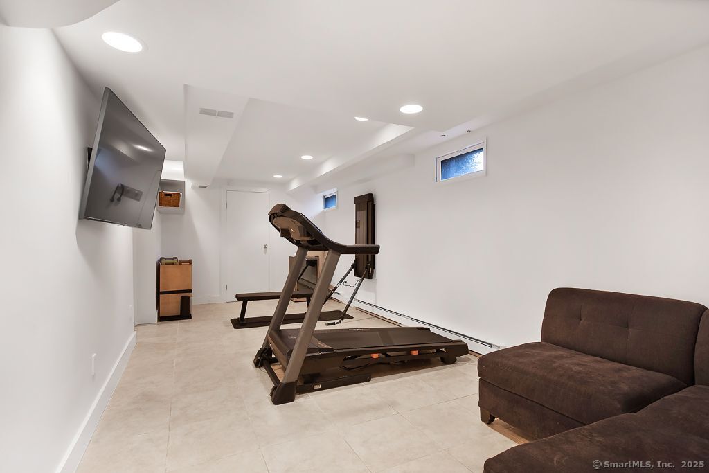 5 Mohawk Lane Woodbridge, CT 06525 - Photo 25 of 28 a view of a room with gym equipment