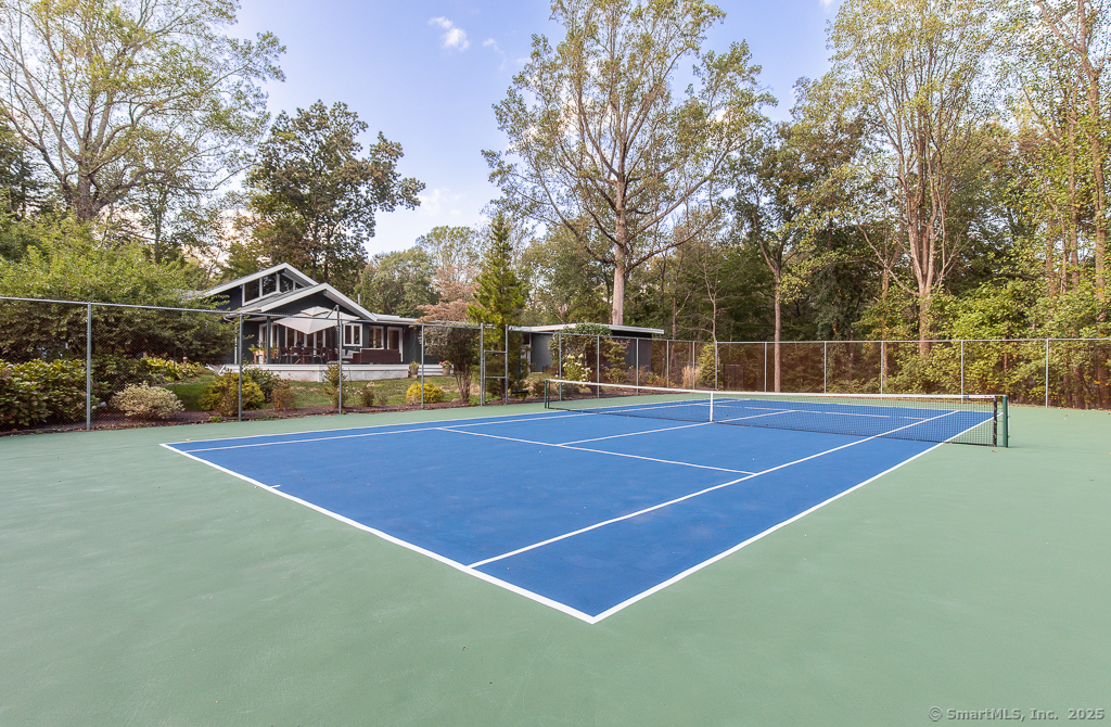 5 Mohawk Lane Woodbridge, CT 06525 - Photo 27 of 28 a tennis court that has tennis net